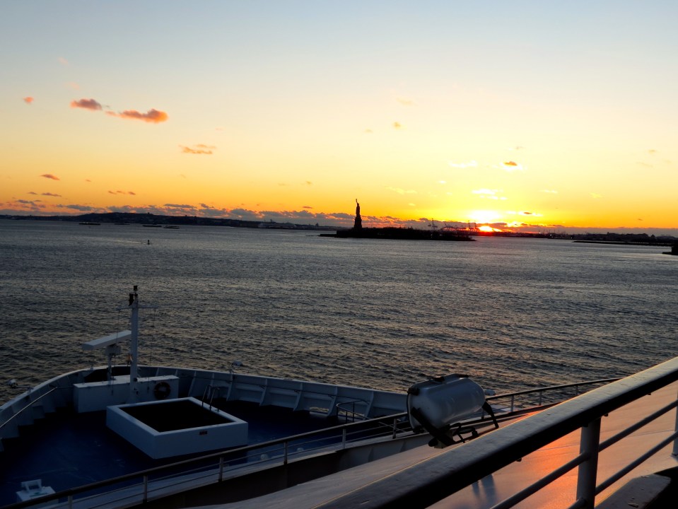 Approaching New York Harbor and the Statue of Liberty.