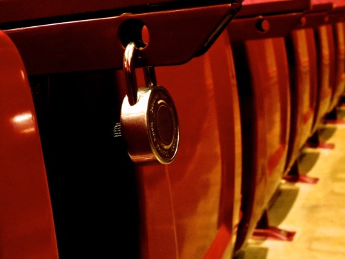 A lock someone attached to an auditorium seat years ago. I don't know how many times I thought about cutting it off.