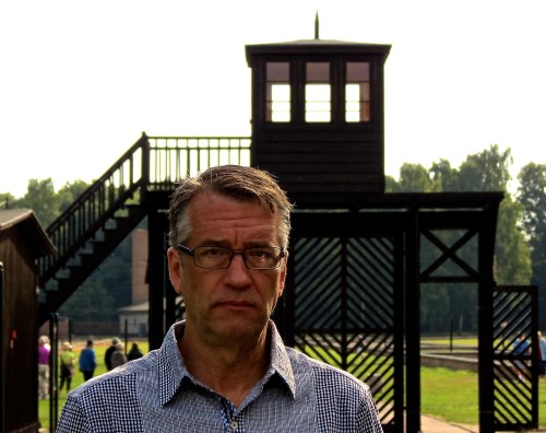 Standing outside the Death Gate at Stutthof Concentration Camp.