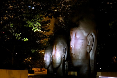 Statues by Jaume Plensa in Millennium Park at 5 am.