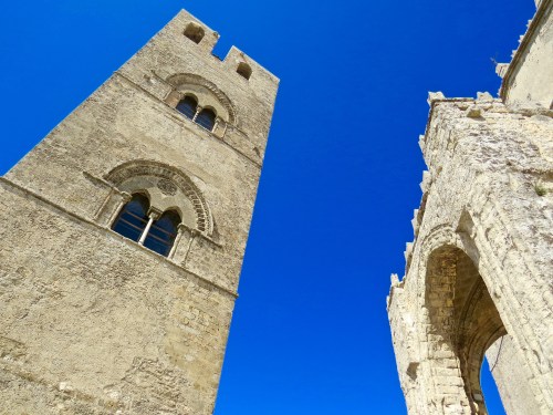 Chiesa Madre against the clear blue sky.